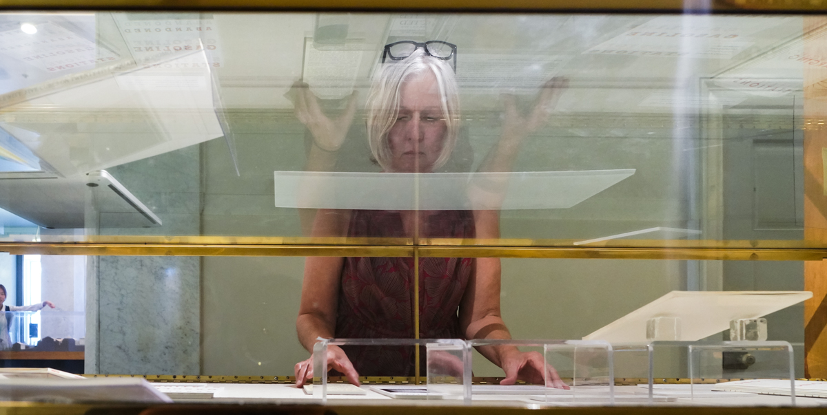 Librarian Lynn Cunningham sets up an exhibit