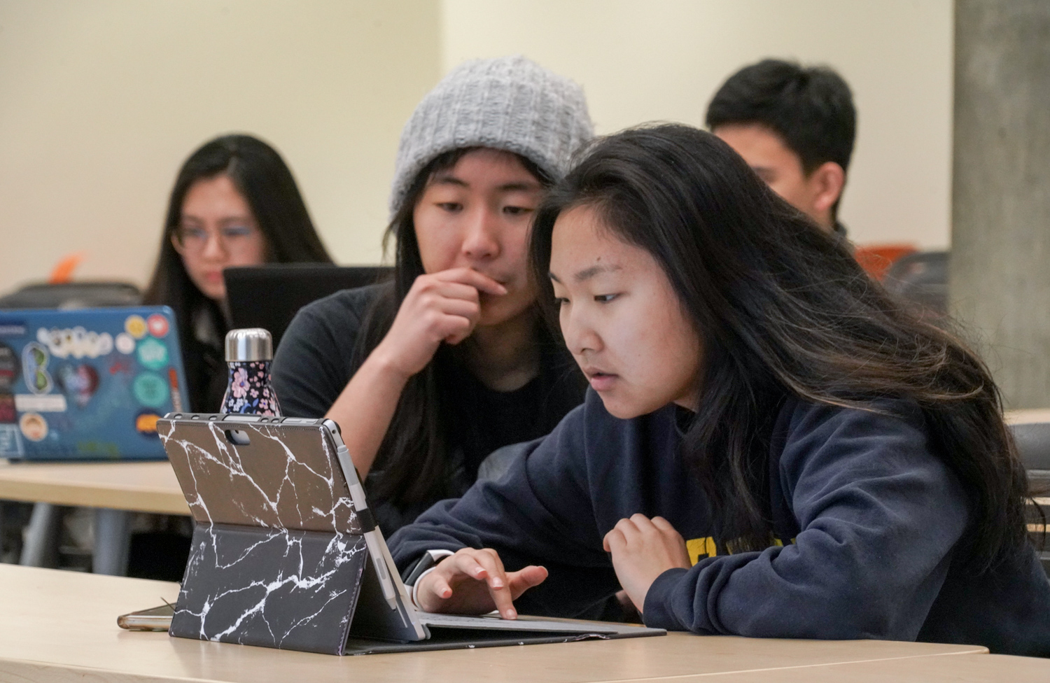 Students working on laptop