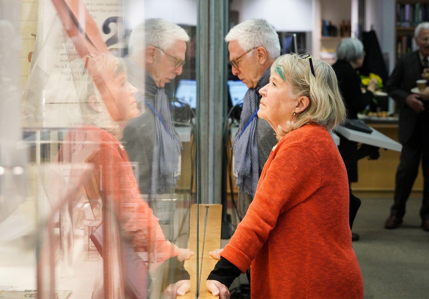 Guests look at artists' book exhibit