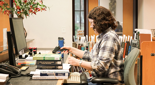 Woman working at front desk