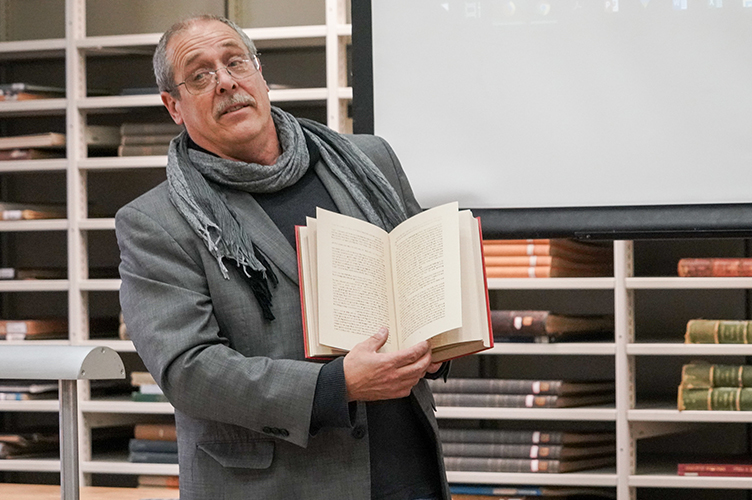 Librarian David Eifler speaks at event