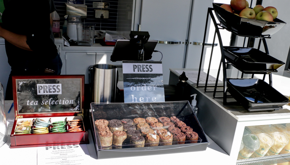 Tea, muffins and fruit are among the items for sale at Press. (Photo by Jami Smith for the University Library)